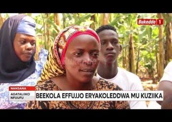 Abooluganda lwa Ssegirinya bekokkoola effujjo eryakoleddwa mu kuziika.